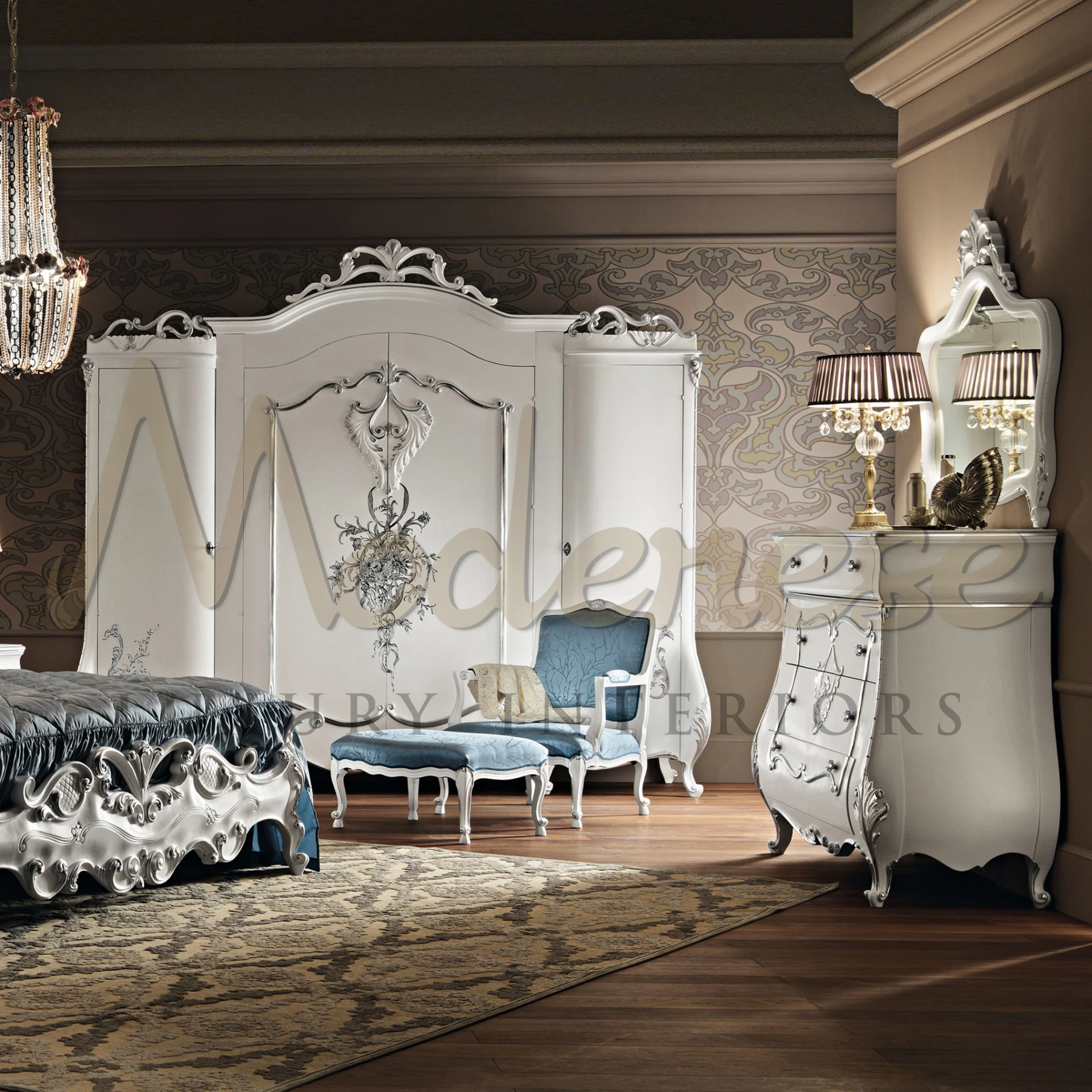 Sophisticated silver-finished drawer chest with decorative embossing and chic handles.                                                                 