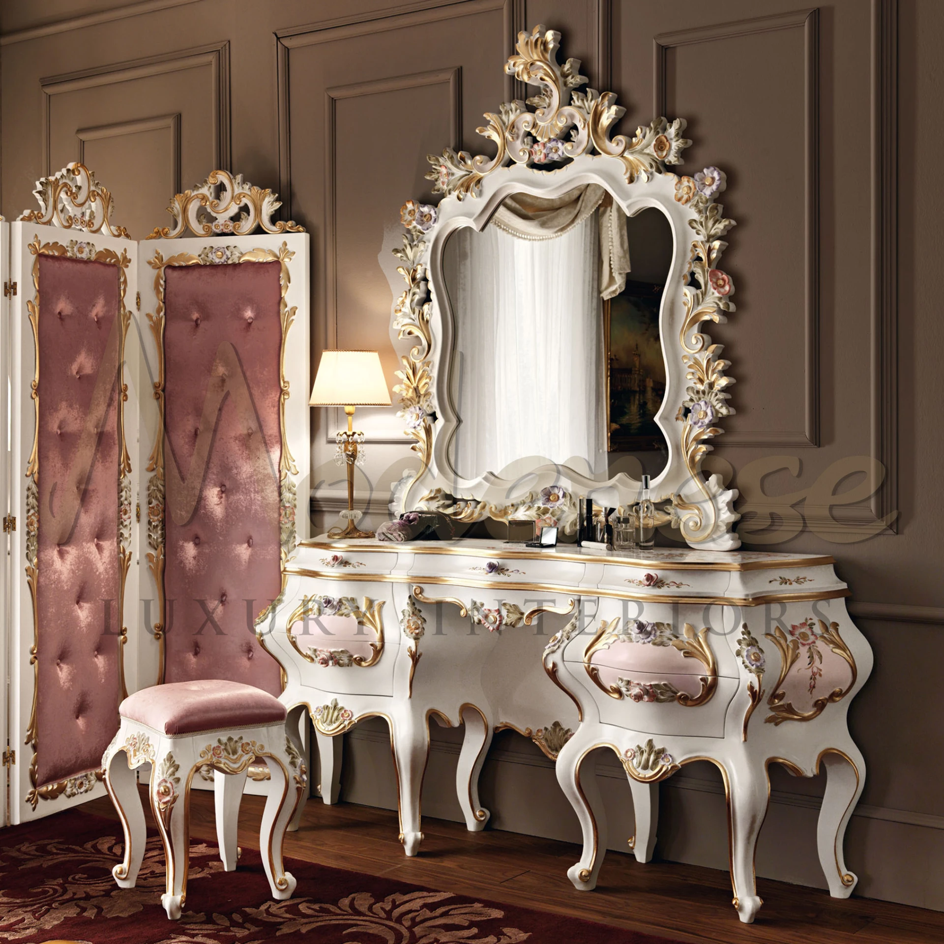 Antique-style classic vanity stool with a soft blush seat and ornate ivory legs.                                                                                           