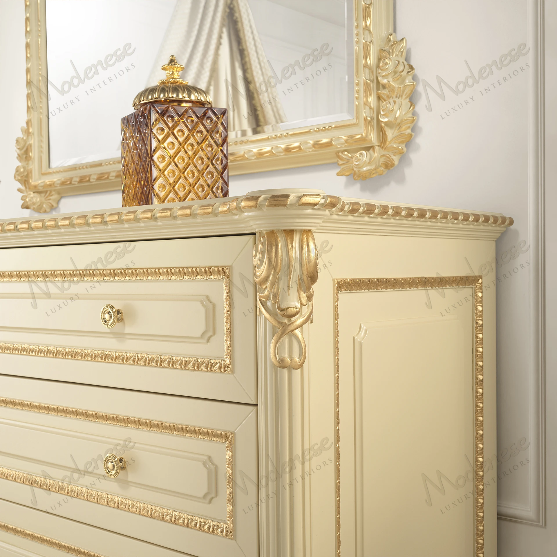 Elegant chest of drawers with ivory lacquered finish and gold leaf details, offering a luxurious touch. No fabric elements