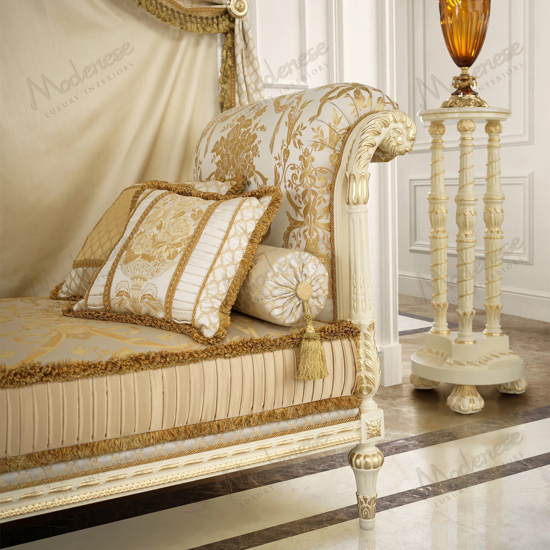 Elegant Golden Radiance Dormeuse with wood structure, ivory lacquer finish, gold leaf details, and sleek design, set against a fabric background