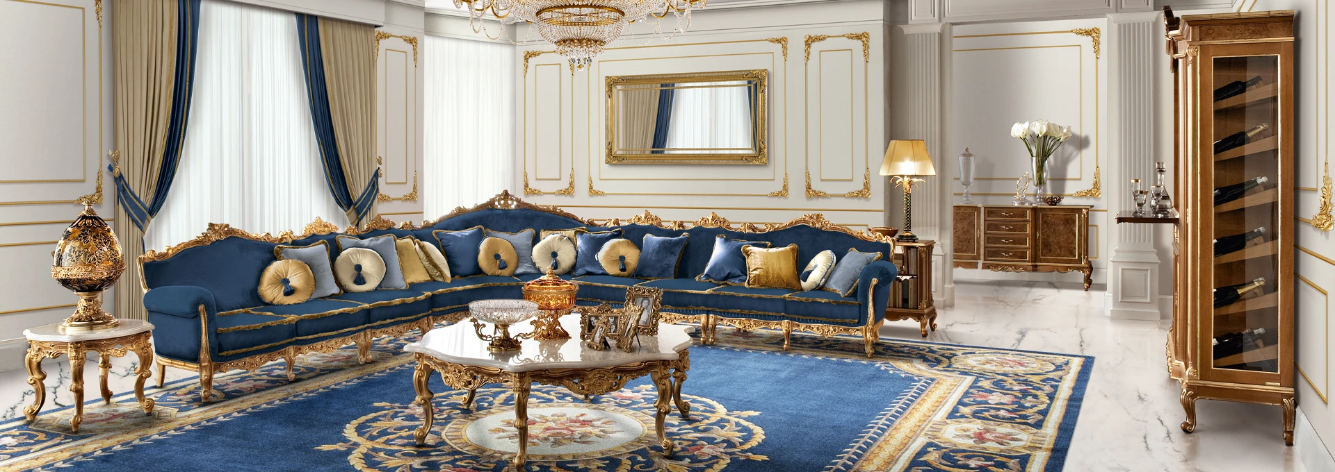 A beautifully carved armchair from the Heritage collection in a soft dove grey, showcasing the new vision for Modenese classical furniture.