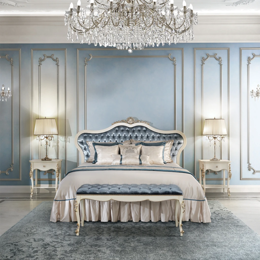 Close-up detail of a Classic Contemporary armchair from the New Collection, showcasing the texture of its grey velvet upholstery and a brushed brass leg.