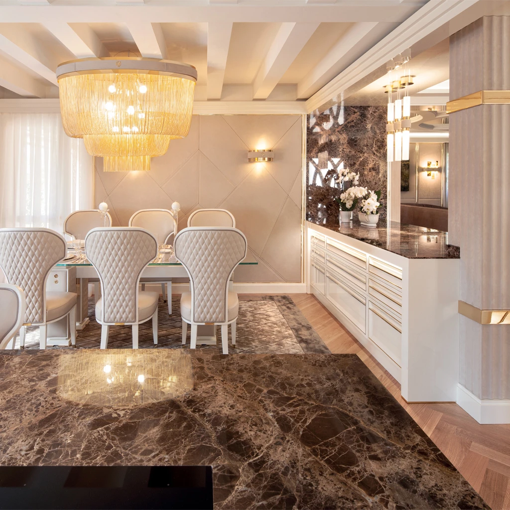 A close-up view of the EVOLUTION Dining rotating wall in motion, revealing a sophisticated champagne display with ambient backlighting.