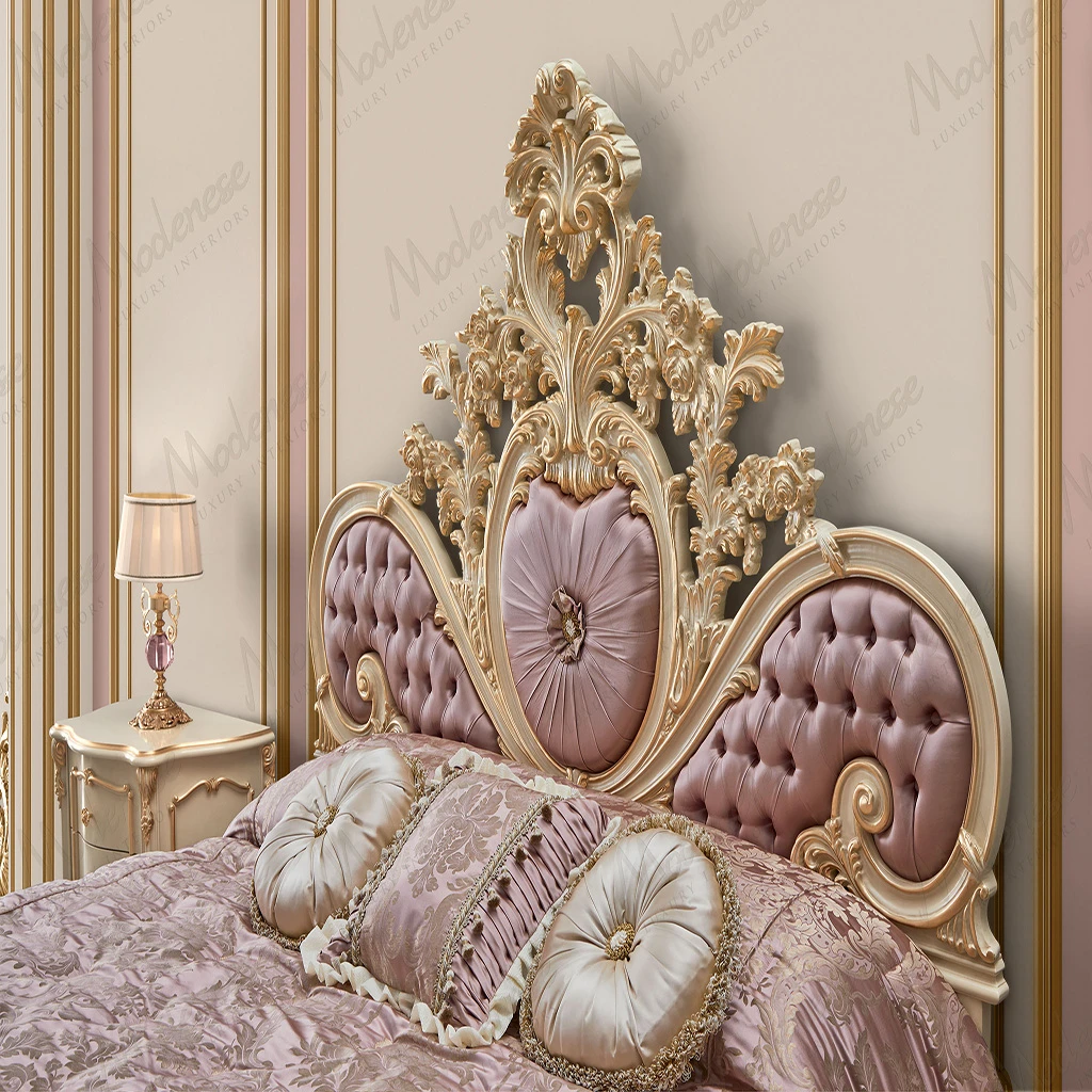 A stylishly arranged trio of luxury pillows on a classic Modenese sofa, featuring complementary Sarelli Fabrics in damask, silk, and brocade patterns.