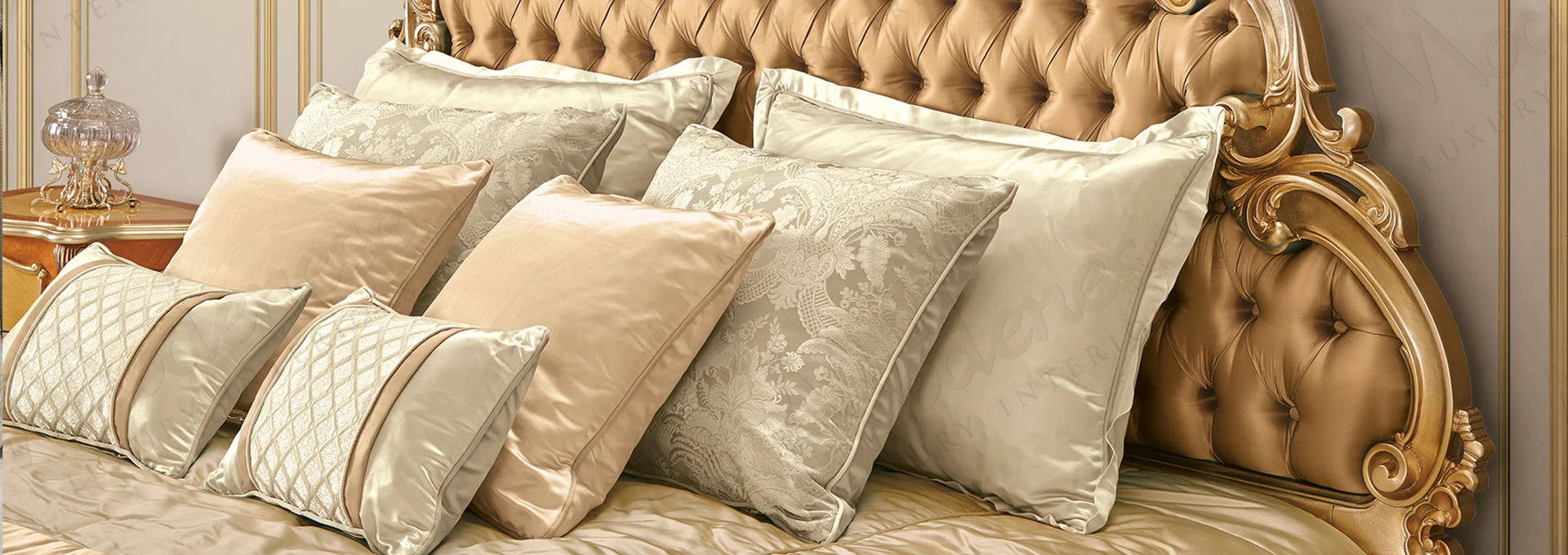 A close-up shot of a sophisticated custom pillow from the Pillows Modenese collection, showcasing the rich texture of classical Sarelli Fabrics in a deep emerald green velvet.