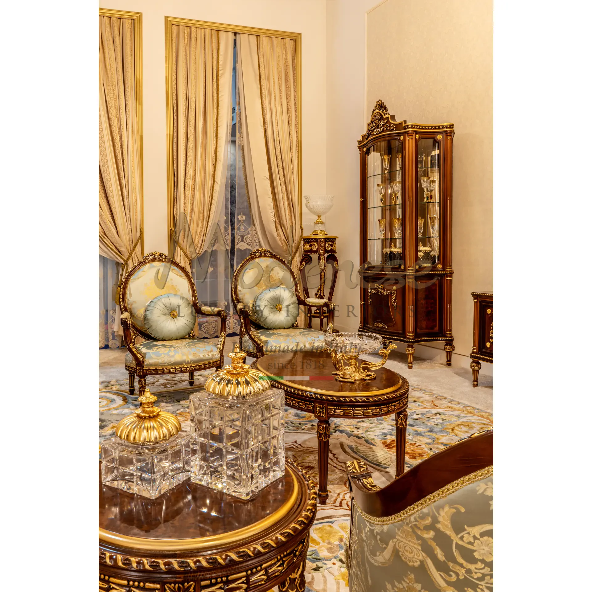 Luxury classic Italian armchair with elegant carved wood frame and refined upholstered seat.