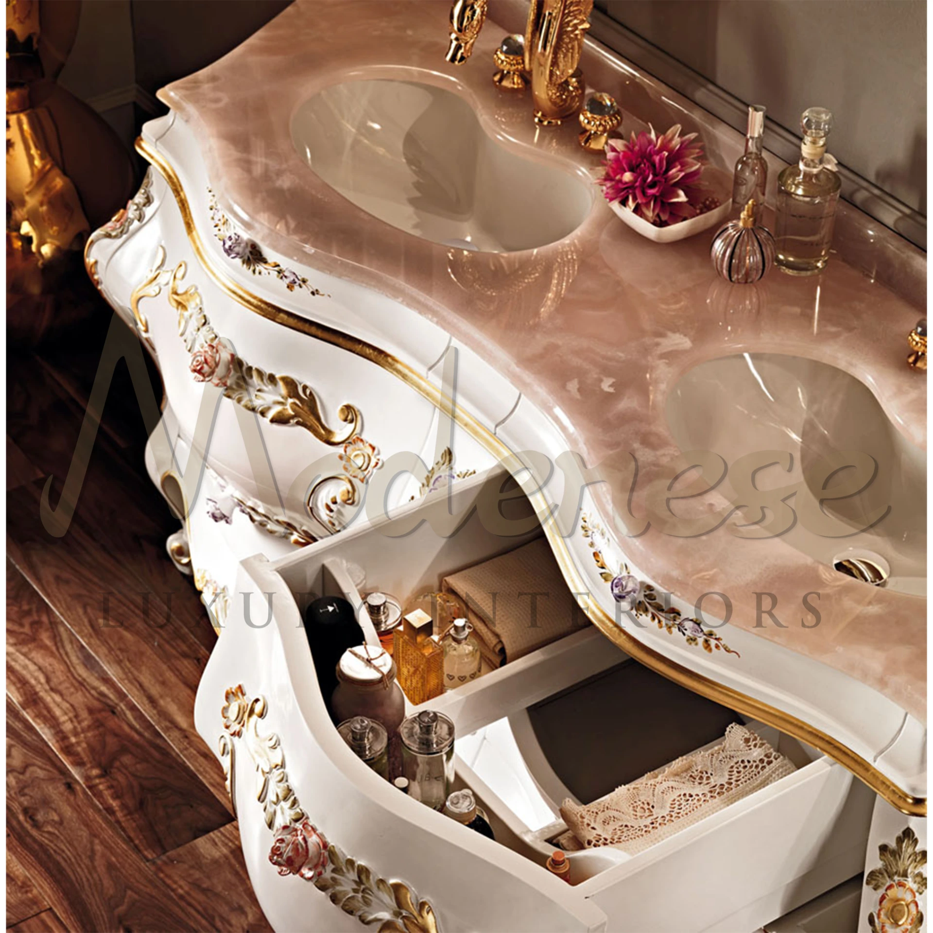 This images shows the details of an open drawer on the classical baroque double sink bathroom cabinet and the top pink onyx