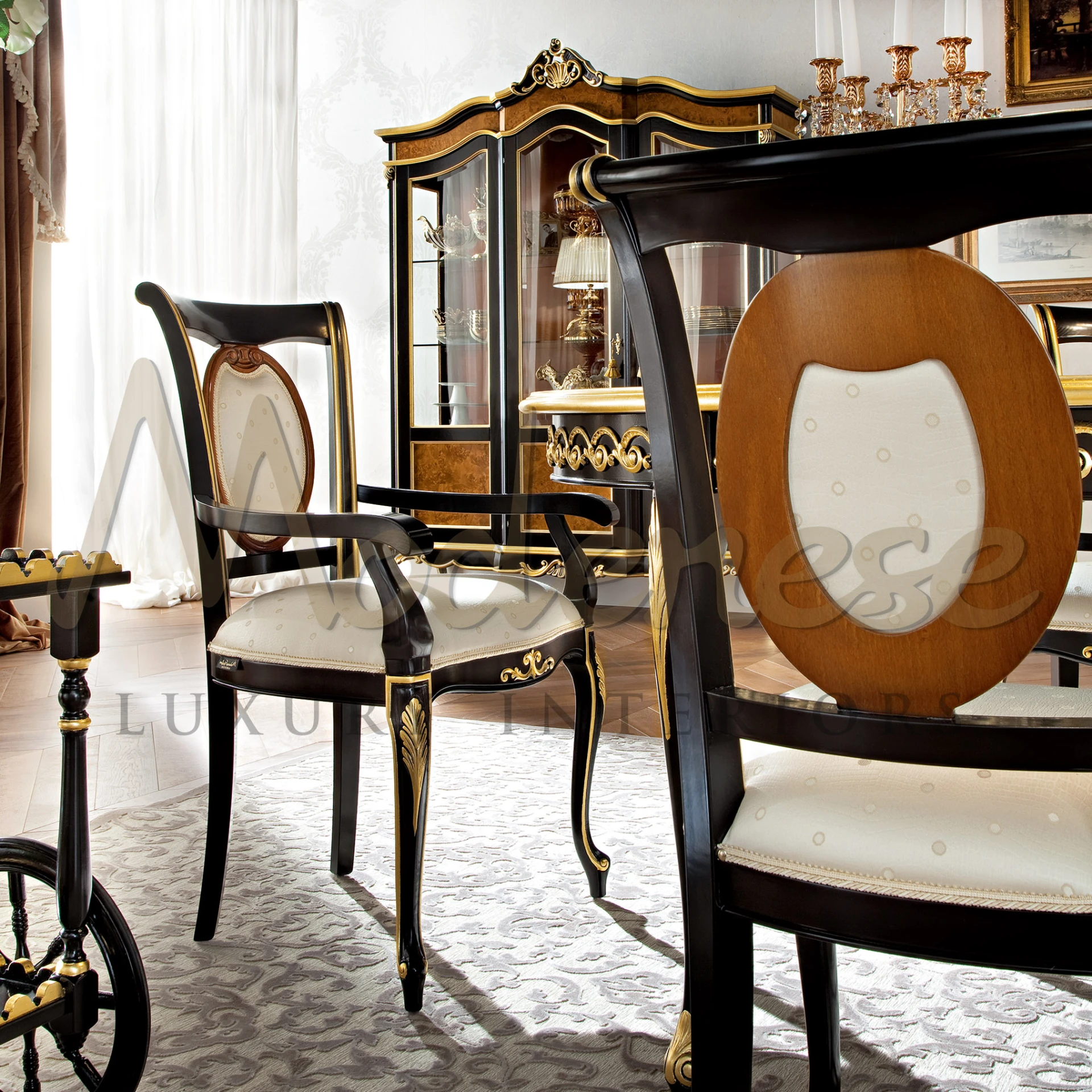 Graceful upholstered seating on a contrasting black lacquered frame, adorned with intricate golden decorations. Customizable to match your decor.