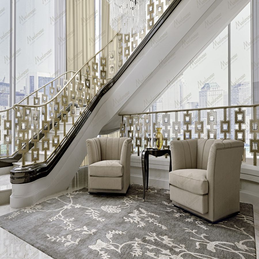 Elegant modern interior featuring a bespoke Sarelli carpet in a deep sapphire blue, defining the sophisticated aesthetic of the Modenese Project.