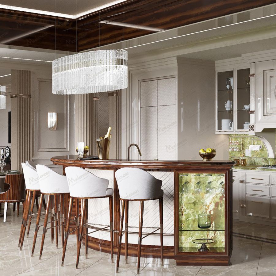 A grand and luxurious Modenese bespoke kitchen in a classic style, featuring ornate white cabinetry with gold leaf accents and a large central island with a marble countertop.
