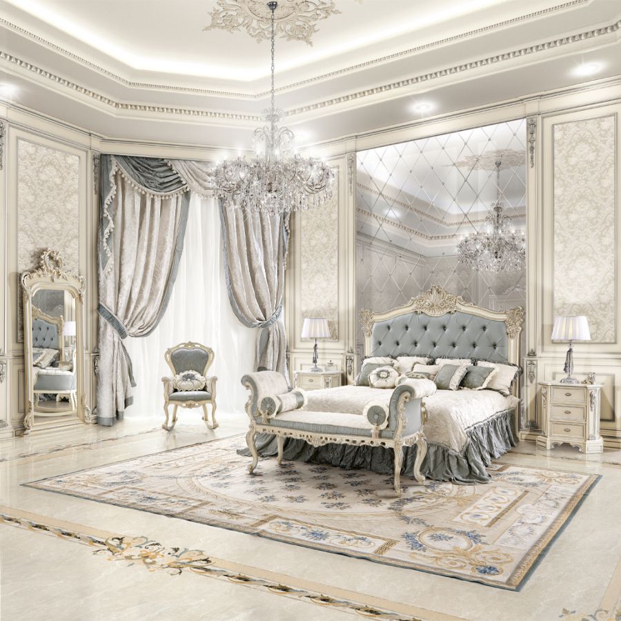 Detailed shot of a luxury Modenese sofa from the Heritage collection, upholstered in a plush, muted blue fabric with a classic hand-carved wooden frame.