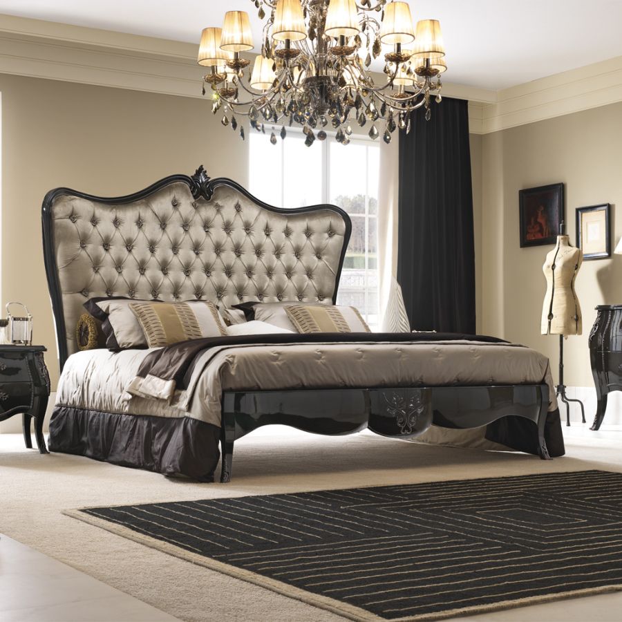 A luxurious curved sofa from the Pregno Prestige Decor collection upholstered in cream bouclé, showcasing contemporary Italian furniture design.