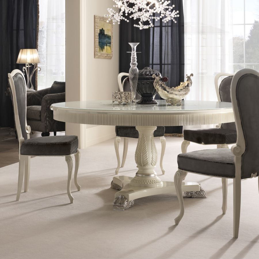 Elegant living room setting featuring the Prestige Decor collection by Modenese Gastone Interiors, highlighting the harmony of curved furniture and minimalist luxury decor.