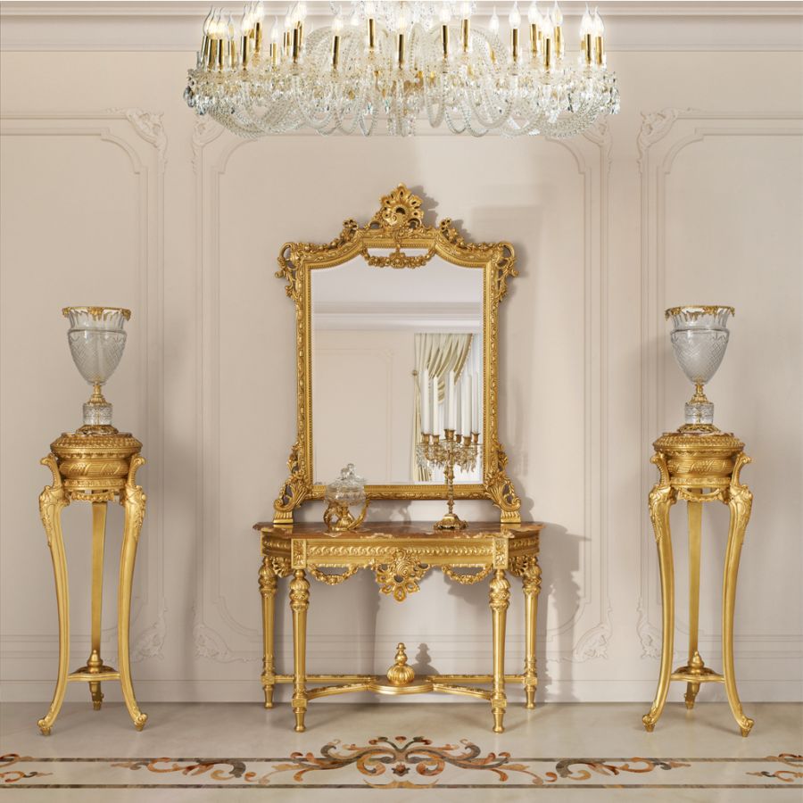 A detailed view of a marble coffee table with a polished brass inlay, a testament to the enduring design and quality materials used in classic interiors.