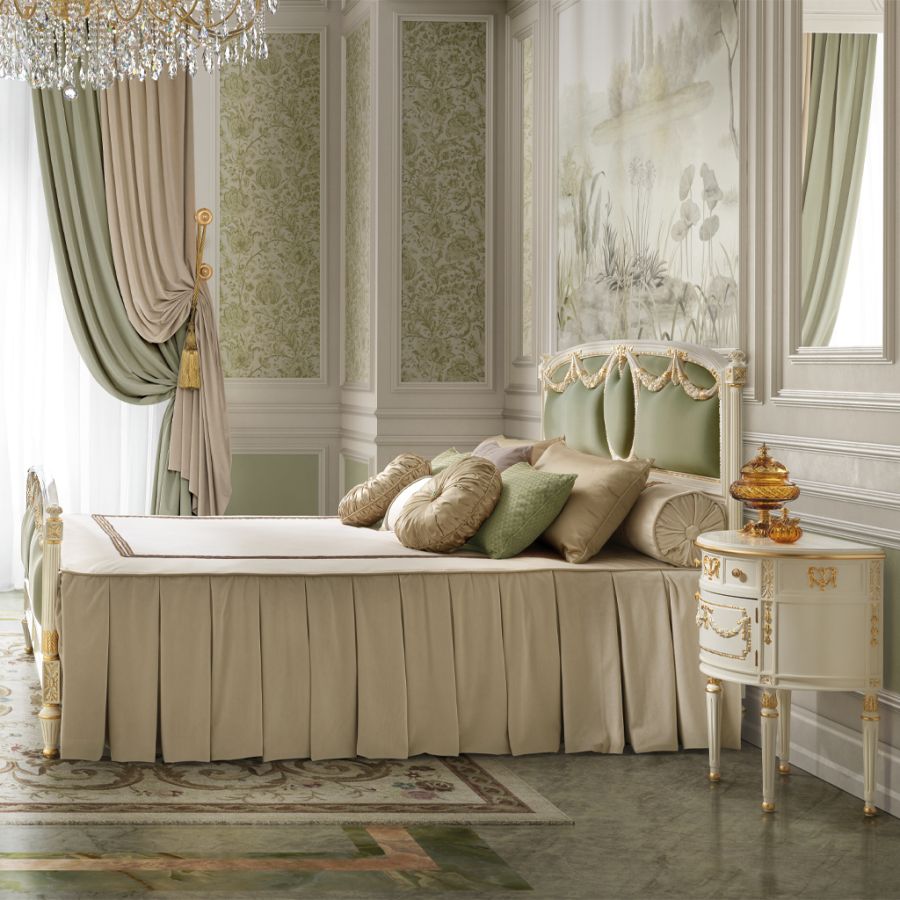 A gracefully curved classic bedroom nightstand in a light wood finish, topped with a sophisticated table lamp, contributing to a serene and timeless bedroom atmosphere.