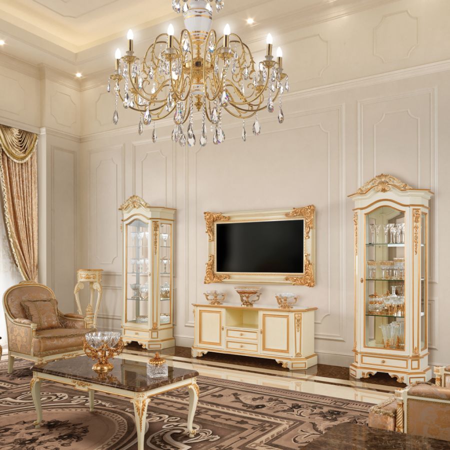 A sumptuous velvet cushion in a dusty rose classic color, resting on a damask chaise lounge, illustrating the use of revisited traditional fabrics in luxury interiors.