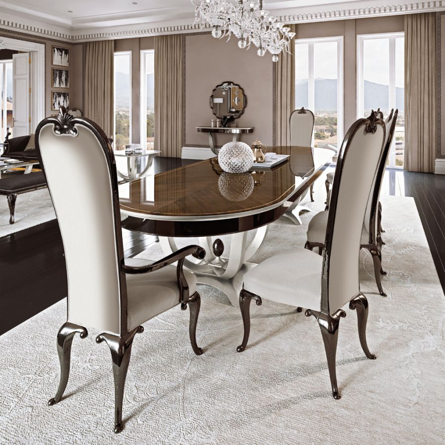 Close-up detail of a modern classic dining chair from the Modenese dining collection, highlighting the exquisite Italian craftsmanship and sophisticated silhouette.